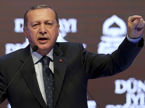 Turkey&#039;s President Recep Tayyip Erdogan talks during a rally in Istanbul, Sunday, March 12, 2017. The escalating dispute between Turkey and the Netherlands spilled over into Sunday, with a Turkis ...