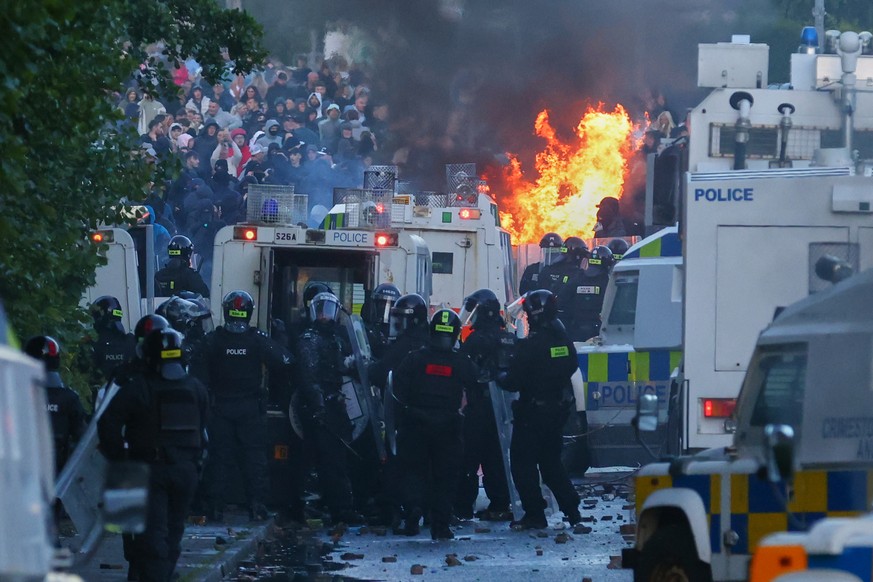 Police attempt to clear protesters near Newtownabbey, in Belfast, Northern Ireland, Wednesday, June 10, 2026, following a stabbing incident on Monday night. (AP Photo/Peter Morrison)
Britain Northern  ...