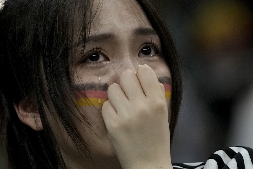 A soccer fan supporting Germany reacts at the end of the World Cup group E soccer match between Costa Rica and Germany at the Al Bayt Stadium in Al Khor , Qatar, Friday, Dec. 2, 2022. (AP Photo/Hassan ...