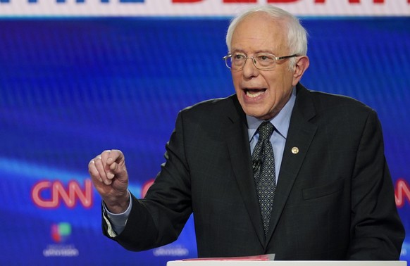 In this Sunday, March 15, 2020, photo, Sen. Bernie Sanders, I-Vt., with former Vice President Joe Biden, speaks during a Democratic presidential primary debate at CNN Studios in Washington. What might ...