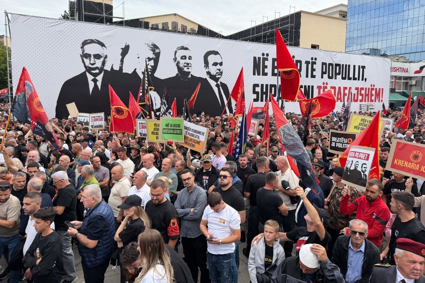 People rally in Pristina, Kosovo, Saturday, Sept. 12, 2026, in support of the former president Hashim Thaci and the other defendants, Kadri Veseli, Rexhep Selimi and Jakup Krasniqi ahead of their verd ...