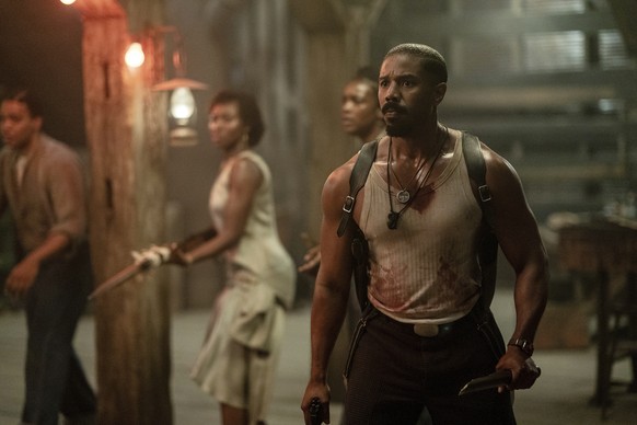 This image released by Warner Bros Pictures shows Michael B. Jordan, right, in a scene from "Sinners." (Warner Bros. Pictures via AP)
Film Review - Sinners