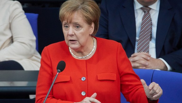 epa06788860 German Chancellor Angela Merkel answers a question during a Q&amp;A session of the German parliament Bundestag in Berlin, Germany, 06 June 2018. The head of government has been questioned  ...