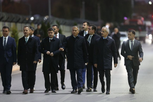 epa11677739 The Minister of Internal Affairs Ali Yerlikaya (4th L) inspects the area after a terror attack at (TUSAS) Turkish Aerospace and Aviation Center&#039;s headquearter in Ankara, Turkey 23 Oco ...
