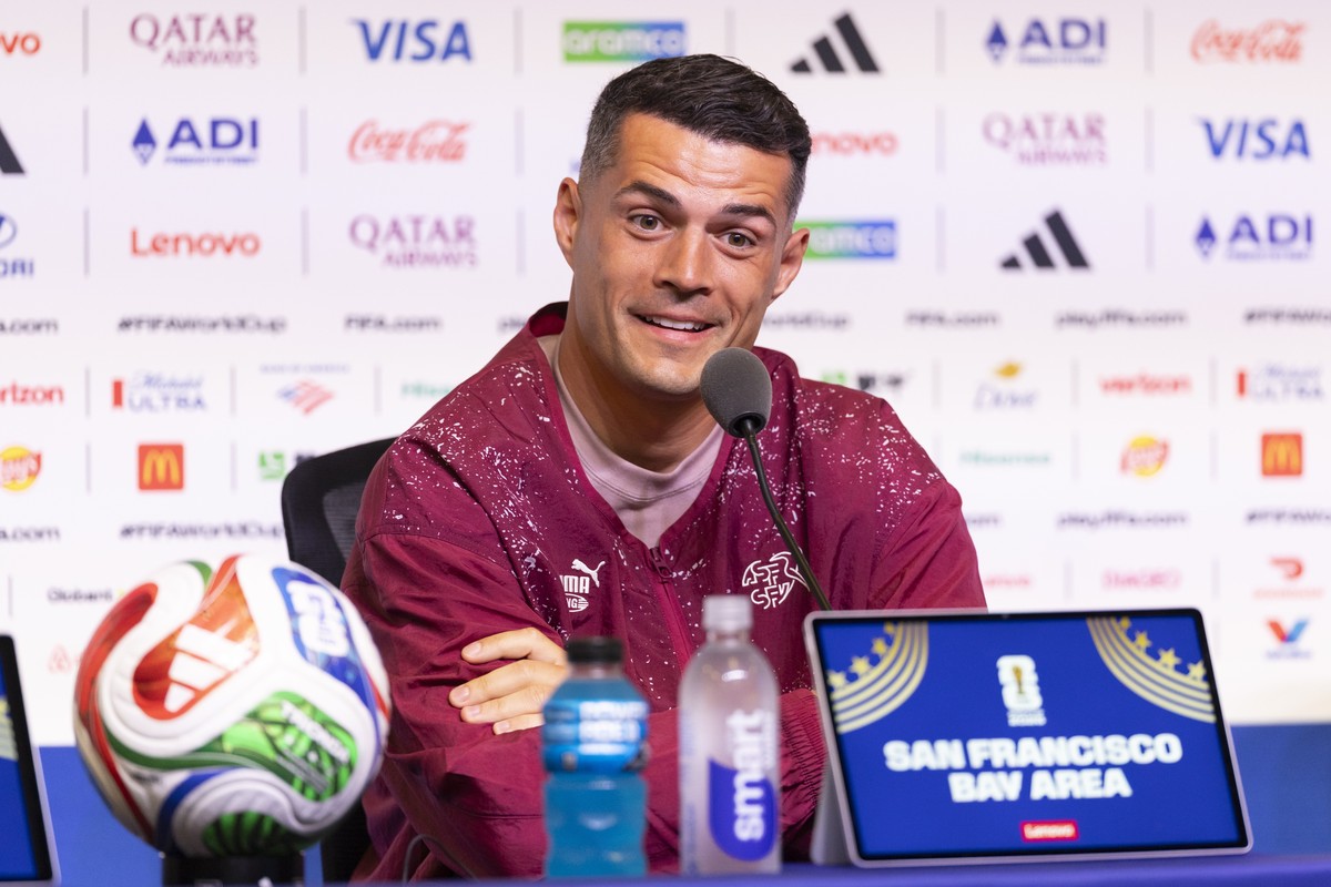 epa13033786 Switzerland's captain Granit Xhaka speaks during a press conference on the eve of the FIFA World Cup 2026 Group B soccer match between Qatar and Switzerland in Santa Clara, California ...