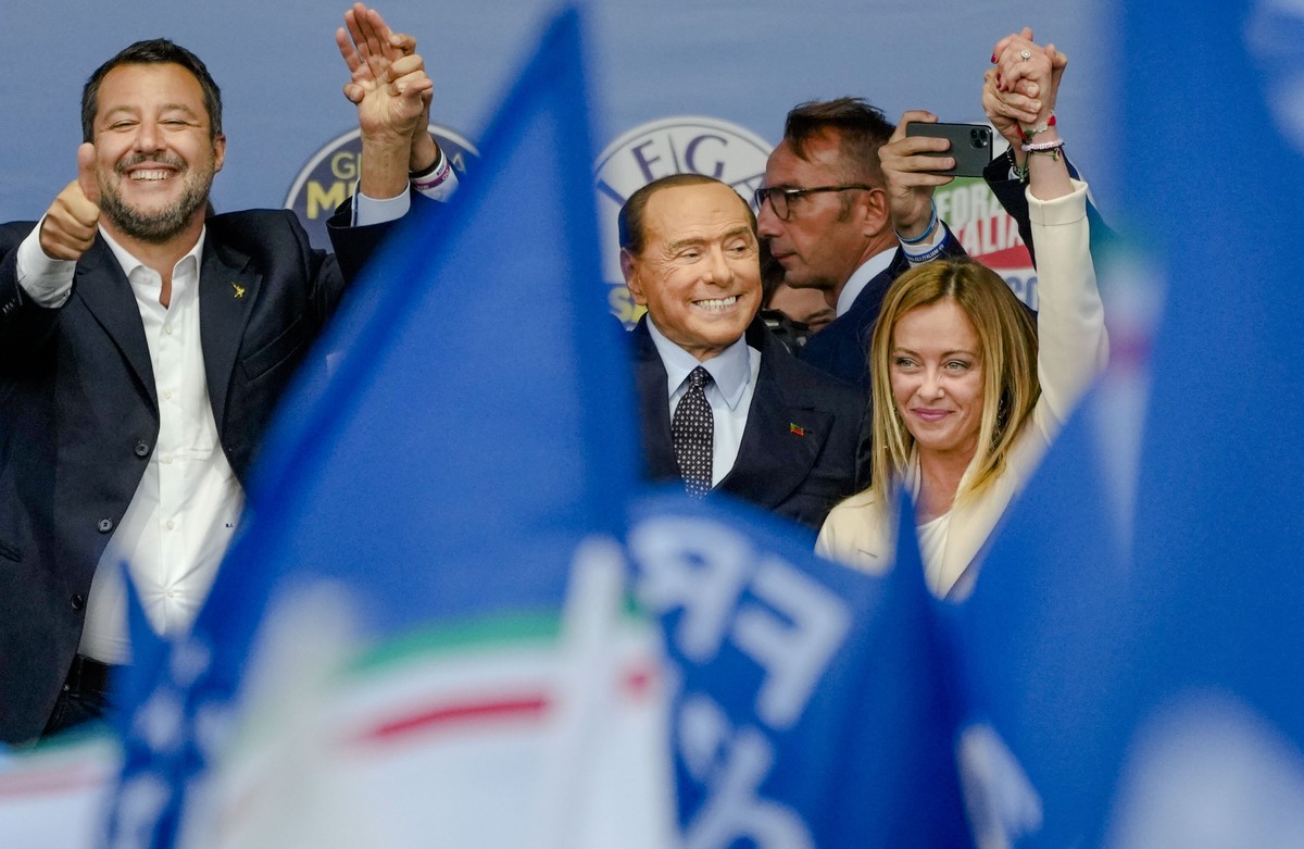 From left, The League's Matteo Salvini, Forza Italia's Silvio Berlusconi, and Brothers of Italy's Giorgia Meloni attend the final rally of the center-right coalition in central Rome, Th ...