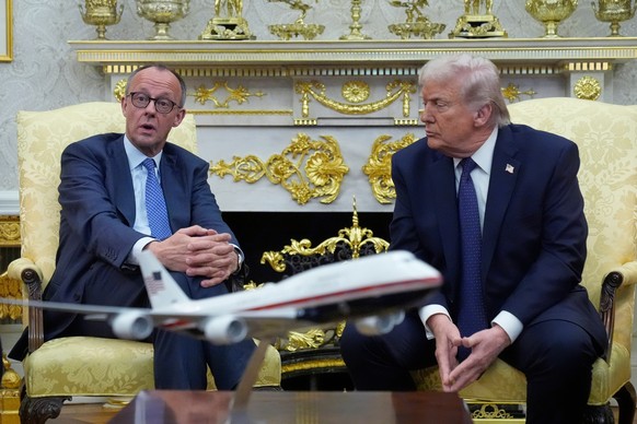 FILE - President Donald Trump meets with German Chancellor Friedrich Merz in the Oval Office at the White House, March 3, 2026, in Washington. (AP Photo/Mark Schiefelbein, File)
Donald Trump,Friedrich ...