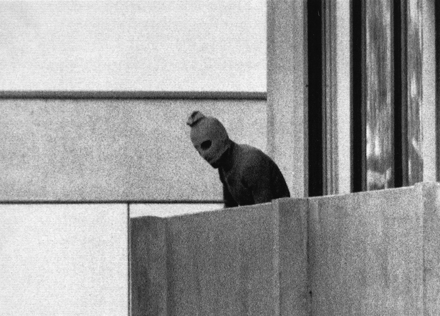 In this Sept. 5, 1972 file photo, a member of the Arab Commando group which seized members of the Israeli Olympic Team at their quarters at the Munich Olympic Village is shown. in&#039;s prime ministe ...