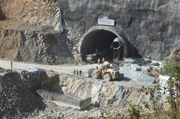 epa10981008 A general view of the tunnel as rescue workers continue to operate at the site of an under-construction tunnel following a collapse, on the Brahmakhal Yamunotri National Highway in Uttarka ...