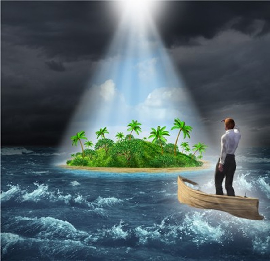 Hope and aspirations success concept as a dark storm ocean background contrasted with a glowing light from above shinning down on a beautiful tropical island as an oasis vision of the promised land.