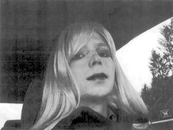 FILE - In this undated file photo provided by the U.S. Army Pfc. Chelsea Manning poses for a photo wearing a wig and lipstick. Manning, a transgender soldier imprisoned in Kansas for leaking classifie ...