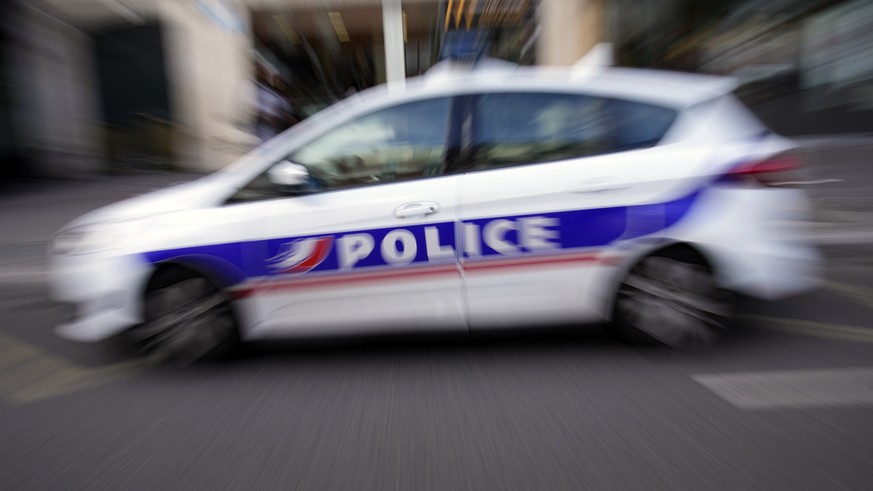 A French Police car patrols in Paris, France, Thursday, Sept. 8, 2022. A French police officer is in custody after shooting to death a driver who failed to obey an order to stopin the southern French  ...