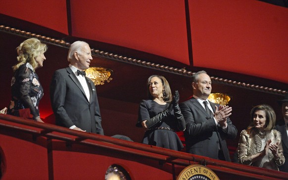 epa10348991 US President Joe Biden (2-L) and First Lady Jill Biden (L) are joined by Vice President Kamala Harris (C) and Second Gentleman Doug Emhoff (2-R) and Speaker of the House Nancy Pelosi (R) a ...