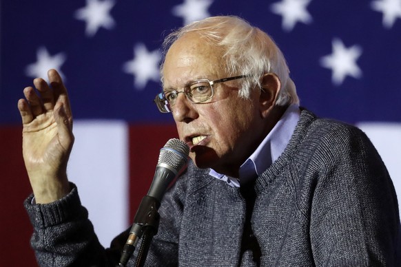 In this Nov. 3, 2016, photo, Sen. Bernie Sanders, I-Vt., campaigns for Democratic presidential candidate Hillary Clinton at the University of Cincinnati. President Barack Obama hands over the White Ho ...