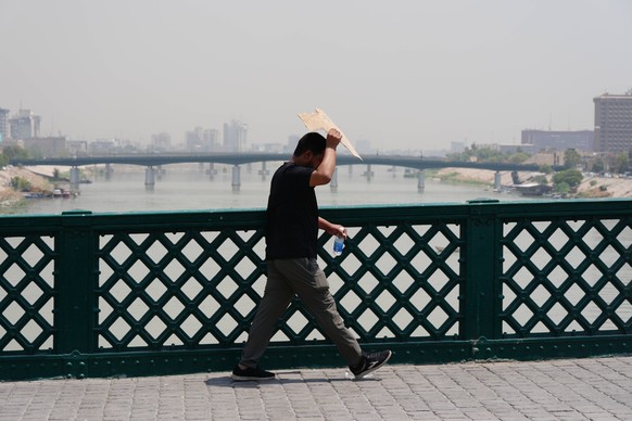 Hot weather in Iraq BAGHDAD, IRAQ - JULY 30: A child jumps into the Tigris River to cool off amid extreme heat in Baghdad, Iraq, on July 30, 2025. Murtadha Al-Sudani / Anadolu Baghdad Iraq. Editorial  ...