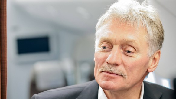 Russia. Moscow. Russian Presidential Press Secretary Dmitry Peskov on a plane before the start of Russian President Vladimir Putin s working trip to St. Petersburg RomanxNaumov