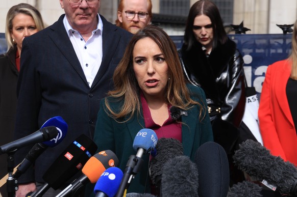 epa11244370 Stella Assange, wife of Julian Assange, talks to the media outside the Royal Courts of Justice after the verdict of Julian Assange&#039;s extradition appeal hearing in London, Britain, 26  ...