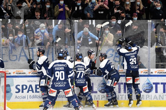 Ambri&#039;s player&#039;s celebrate the victory at the end of the preliminary round game of National League Swiss Championship between HC Ambri-Piotta and HC Davos at the Gottardo Arena in Ambri, on  ...