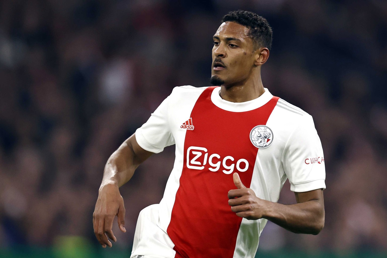 epa09827420 Sebastien Haller of Ajax during the UEFA Champions League round of 16 soccer match between Ajax Amsterdam and Benfica Lisbon at the Johan Cruijff ArenA in Amsterdam, Netherlands, 15 March  ...