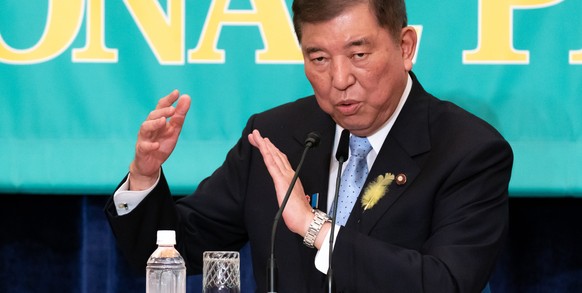 epa12209680 Japan&#039;s Prime Minister and Liberal Democratic Party President Shigeru Ishiba speaks during a debate with leaders of other political parties at the Japan National Press Club in Tokyo,  ...