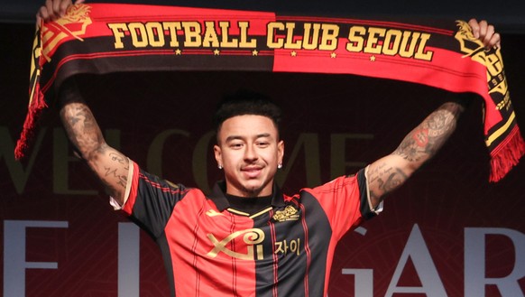 epa11135577 Former Manchester United midfielder and English international Jesse Lingard poses for a photo during a press conference at Seoul World Cup Stadium, South Korea, 08 February 2024, as the 31 ...