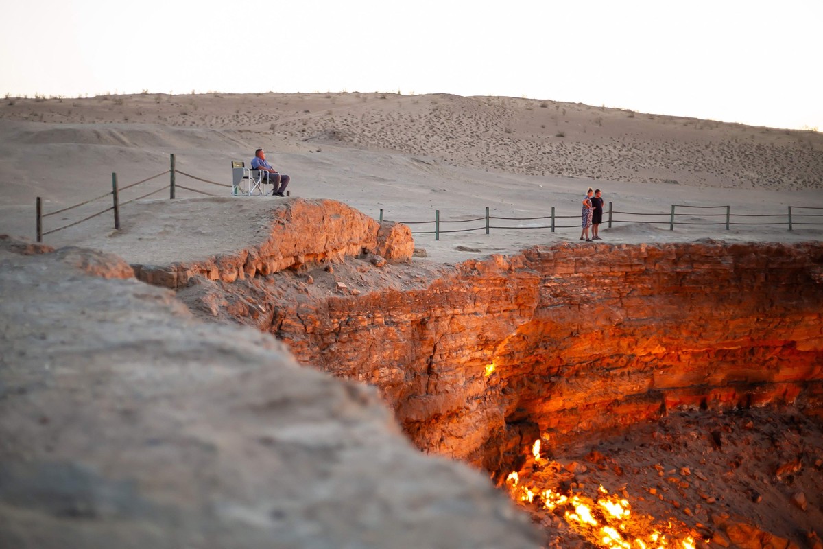 A view taken on June 28, 2025 shows the Darvaza gas crater dubbed the "Gateway to Hell" in the middle of Turkmenistan's Karakum desert. (Photo by AFP)