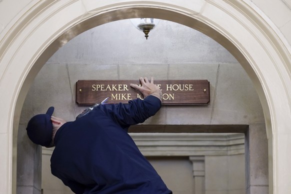 A new sign is installed above the entrance to the office of House Speaker Mike Johnson, R-La., Wednesday, Oct. 25, 2023, at the Capitol in Washington. Republicans eagerly elected Johnson as House spea ...