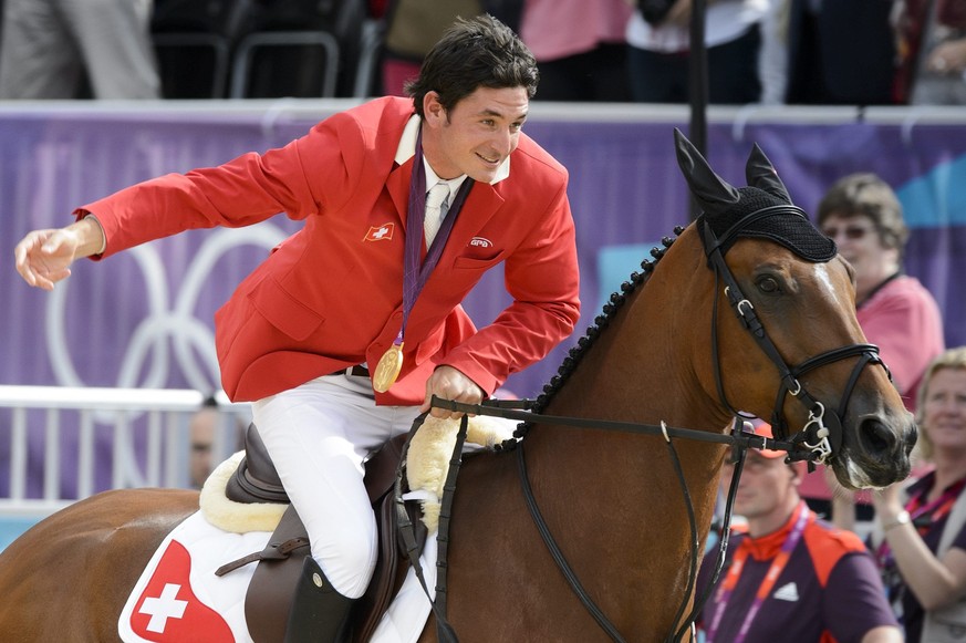 ALS VORSCHAU ZU DEN OLYMPISCHEN SOMMERSPIELEN IN RIO VOM 5. BIS 21. AUGUST 2016 STELLEN WIR IHNEN EINE AUSWAHL AN SCHWEIZER GOLDMEDAILLENGEWINNERN ZUR VERFUEGUNG - Gold medalist Switzerland's Ste ...