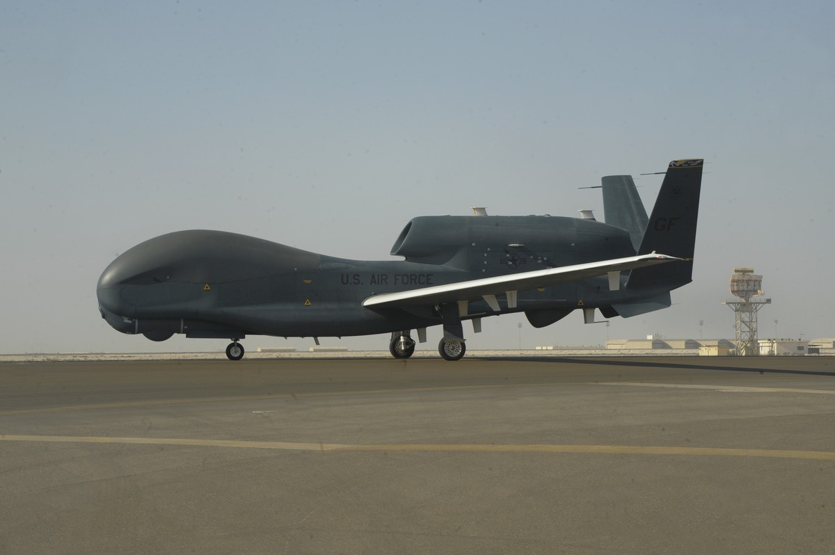 In this Feb. 13, 2018, photo released by the U.S. Air Force, an RQ-4 Global Hawk is seen on the tarmac of Al-Dhafra Air Base near Abu Dhabi, United Arab Emirates. Iran's Revolutionary Guard shot  ...