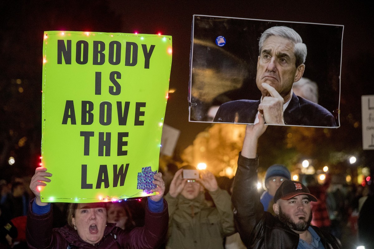 Protesters gather in front of the White House in Washington, Thursday, Nov. 8, 2018, as part of a nationwide "Protect Mueller" campaign demanding that Acting U.S. Attorney General Matthew Wh ...