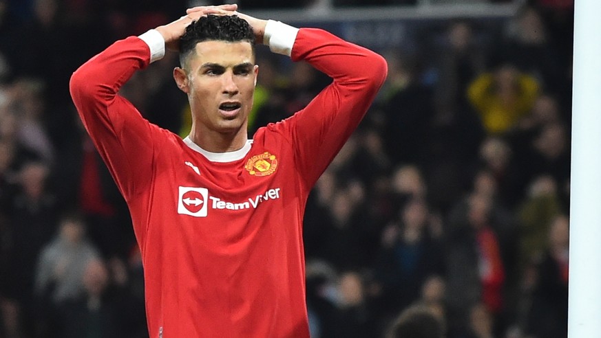epa09827503 Manchester United&#039;s Cristiano Ronaldo reacts during the UEFA Champions League round of 16, second leg soccer match between Manchester United and Atletico Madrid in Manchester, Britain ...