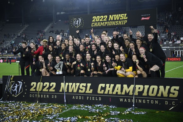 Portland Thorns FC pose with the trophy after they won the NWSL championship soccer match against the Kansas City Current, Saturday, Oct. 29, 2022, in Washington. Portland won 2-0. (AP Photo/Nick Wass ...