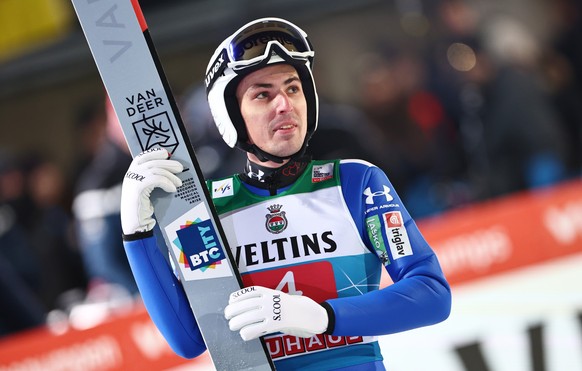 epa12617209 Timi Zajc of Slovenia reacts during Round 2 of the Men's Large Hill HS137 competition at the 74th Four Hills ski jumping tournament, in Oberstdorf, Germany, 29 December 2025. EPA/ANNA ...