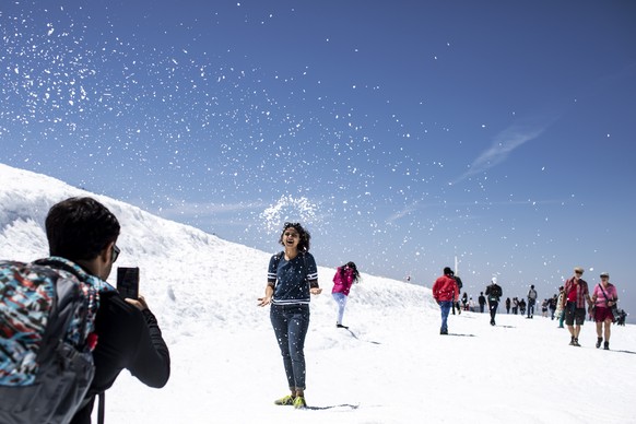 epa07674790 Tourists enjoy the summer temperatures on the Titlis mountain, near Engelberg, Switzerland, 26 June 2019. Europe is bracing itself for a heatwave, as forcasters predict temperatures are ex ...