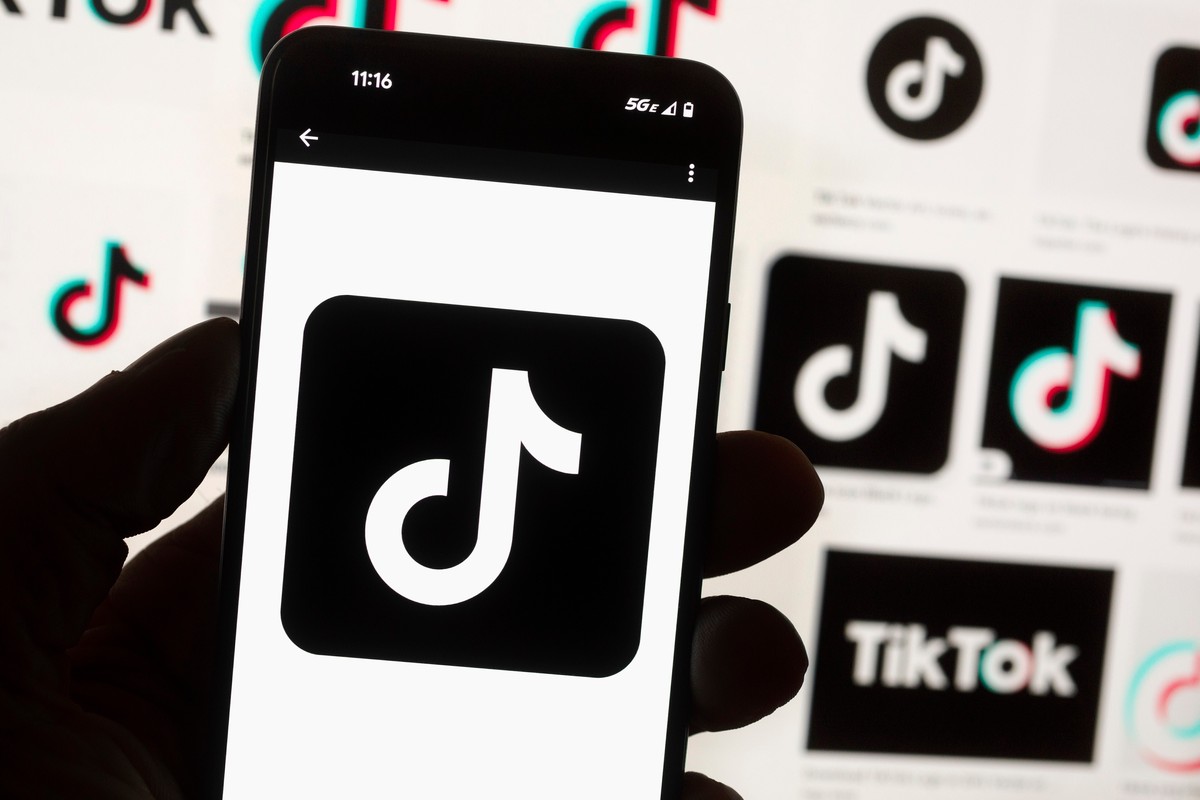 FILE - The TikTok logo is displayed on a mobile phone in front of a computer screen, Oct. 14, 2022, in Boston. (AP Photo/Michael Dwyer, File)
Belgium EU TikTok