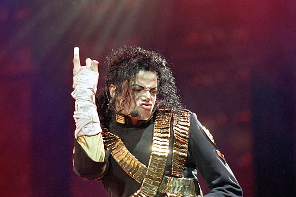 FILE - This Aug. 25, 1993 file photo shows American pop star Michael Jackson performing during his &quot;Dangerous&quot; tour in Bankok. Tuesday, June 25, 2019, marks the tenth anniversary of Jackson& ...