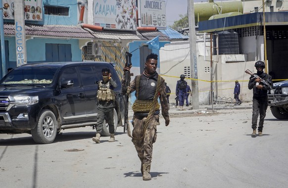 FILE - Security forces patrol the scene after gunmen stormed the Hayat Hotel in Somalia's capital Mogadishu on August 21, 2022.  Somalia has launched what is being called the main mili…