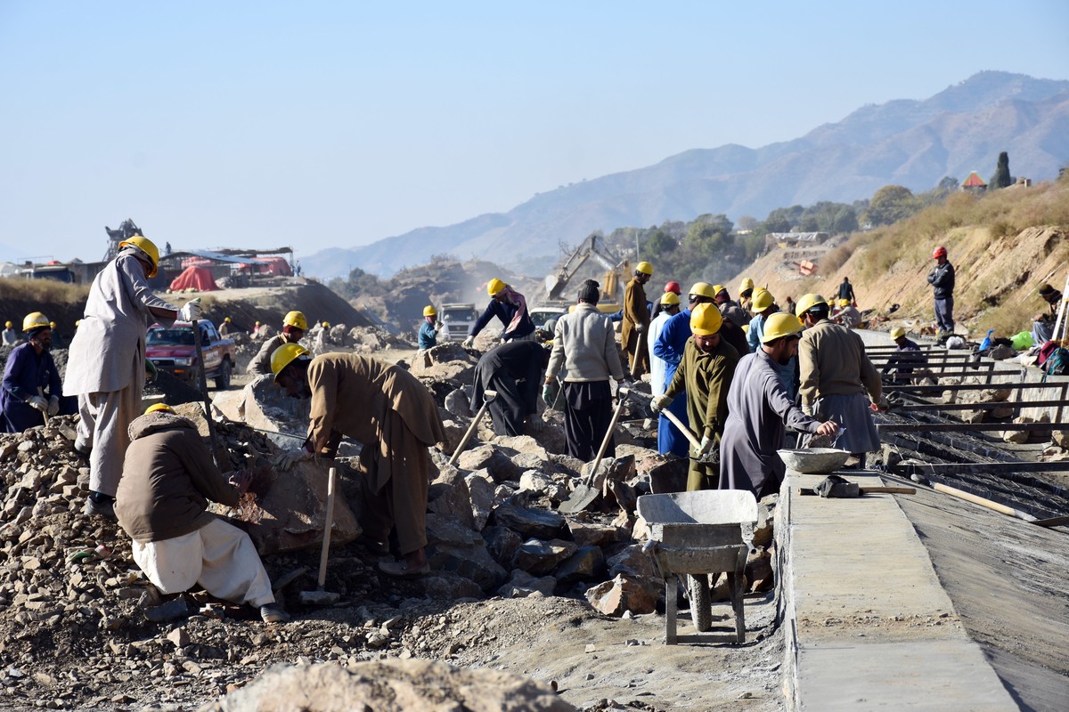 In this Dec. 22, 2017, photo, work in progress at the site of Pakistan China Silk Road in Haripur, Pakistan. From Pakistan to Tanzania to Hungary, projects under Chinese President Xi Jinping's si ...