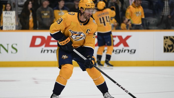 Nashville Predators defenseman Roman Josi (59) warms up before an NHL hockey game against the Pittsburgh Penguins, Tuesday, Nov. 28, 2023, in Nashville, Tenn. (AP Photo/George Walker IV)