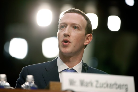 FILE - Facebook CEO Mark Zuckerberg testifies before a joint hearing of the Commerce and Judiciary Committees on Capitol Hill in Washington, April 10, 2018, about the use of Facebook data to target Am ...