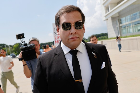 epa11555415 Former Republican Congressman from New York George Santos arrives at Federal Court in Central Islip, in New York, USA, 19 August 2024. Santos had previously pleaded not guilty to all 23 ch ...