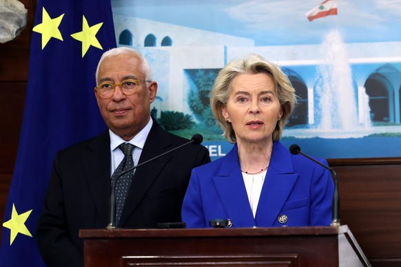 epa12638727 A handout photo made available by the Lebanese Presidency press office shows European Council President Antonio Costa (L) looking on as Commission President Ursula von der Leyen (R) speaks ...