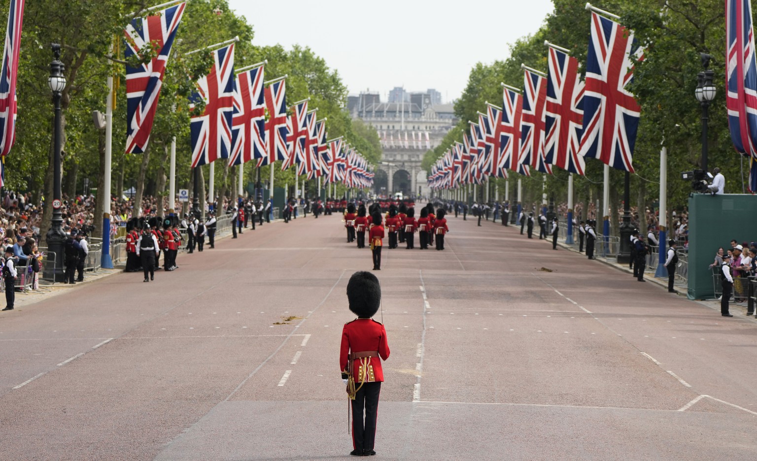 Troops marching down the Mall to Horse Guards parade to take part in the Trooping the Colour parade at Buckingham Palace, in London, Saturday, June 17, 2023. Trooping the Colour is the King&#039;s Bir ...