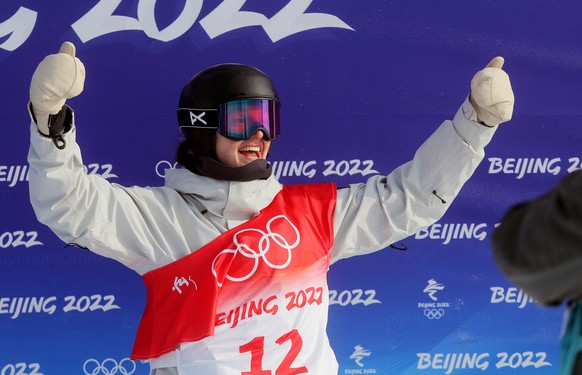 epa09742376 Berenice Wicki of Switzerland reacts during the Women&#039;s Snowboard Halfpipe final at the Zhangjiakou Genting Snow Park at the Beijing 2022 Olympic Games, Zhangjiakou, China, 10 Februar ...