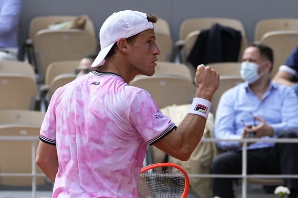 Argentina&#039;s Diego Schwartzman clenches his fist as he plays Spain&#039;s Rafael Nadal during their quarterfinal match of the French Open tennis tournament at the Roland Garros stadium Wednesday,  ...