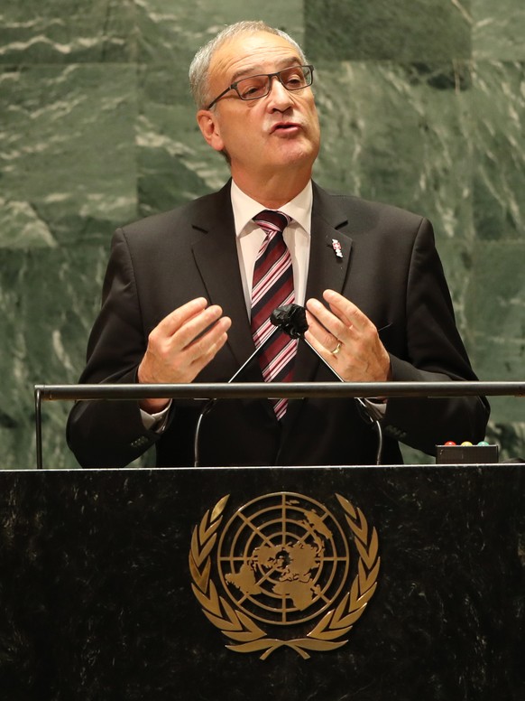 epa09480199 Swiss President Guy Parmelin addresses the 76th Session of the United Nations General Assembly, at UN headquarters, in New York City, New York, USA, 21 September 2021. EPA/SPENCER PLATT /  ...