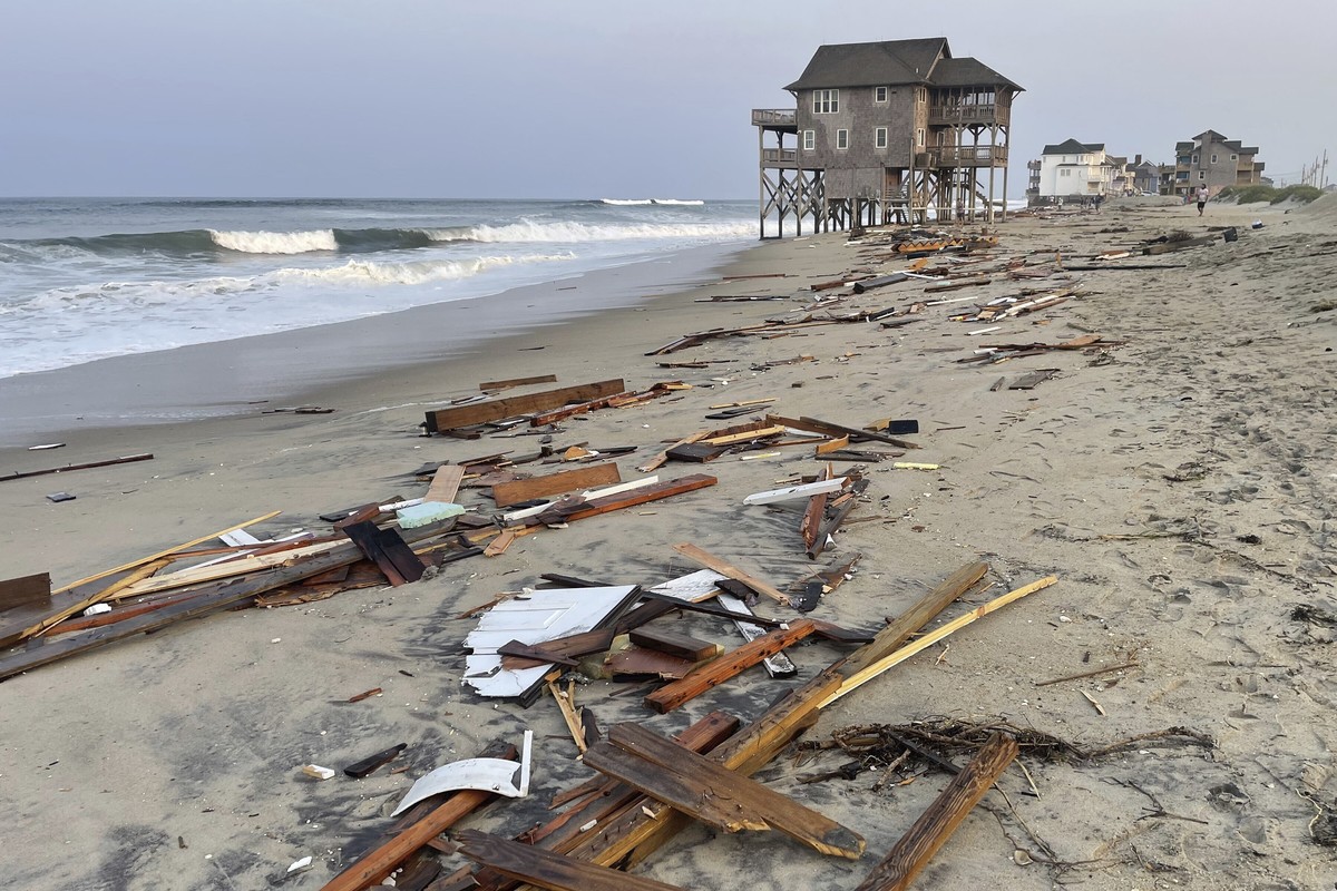 This photo provided by the National Park Service on Friday, Aug. 16, 2024, in Rodanthe, N.C., along the Cape Hatteras National Seashore shows debris from an unoccupied beach house that collapsed into  ...