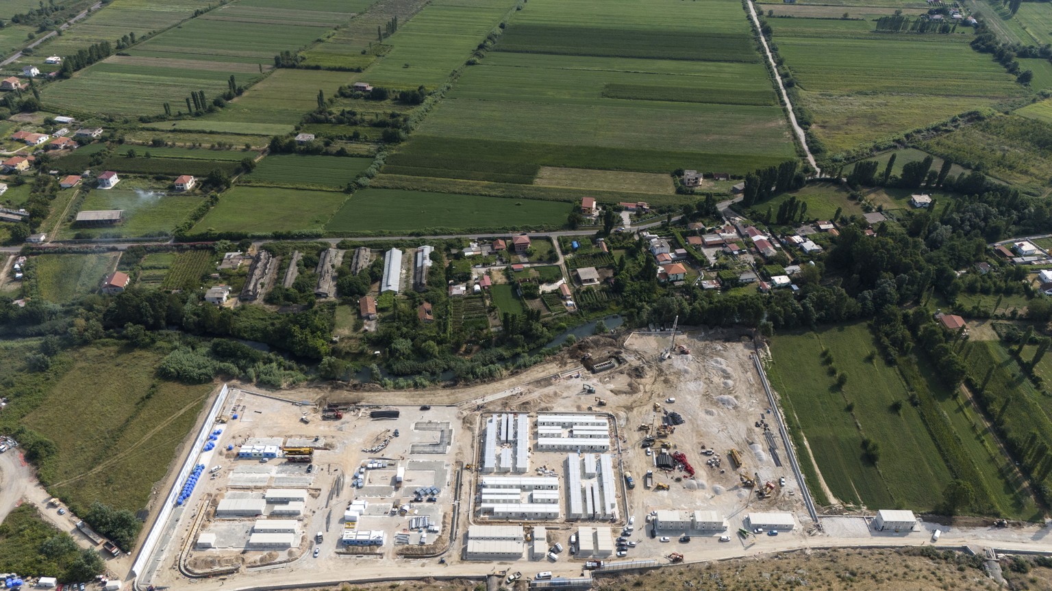 A migrant center is seen from above in Gjader, northwest Albania, Thursday, July 25, 2024. Migrants rescued at sea while attempting to reach Italy are likely to see themselves transported to Albania f ...