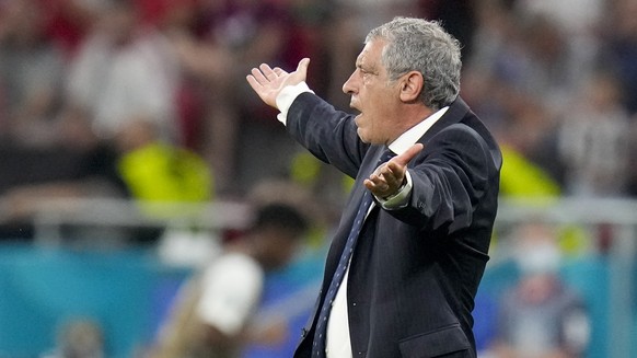 Portugal&#039;s manager Fernando Santos reacts during the Euro 2020 soccer championship group F match between Portugal and France at the Puskas Arena, Budapest, Hungary, Wednesday, June 23, 2021. (AP  ...