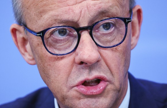 epa12183765 German Chancellor Friedrich Merz attends a news conference following a meeting of heads of government of the federal states at the Chancellery in Berlin, Germany, 18 June 2025. EPA/HANNIBA ...